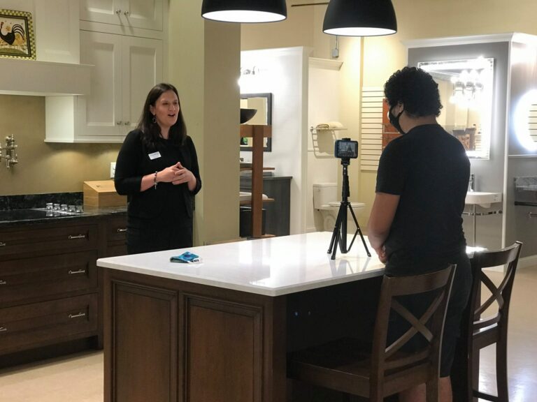 Smartphone on a tripod to film a video in a kitchen